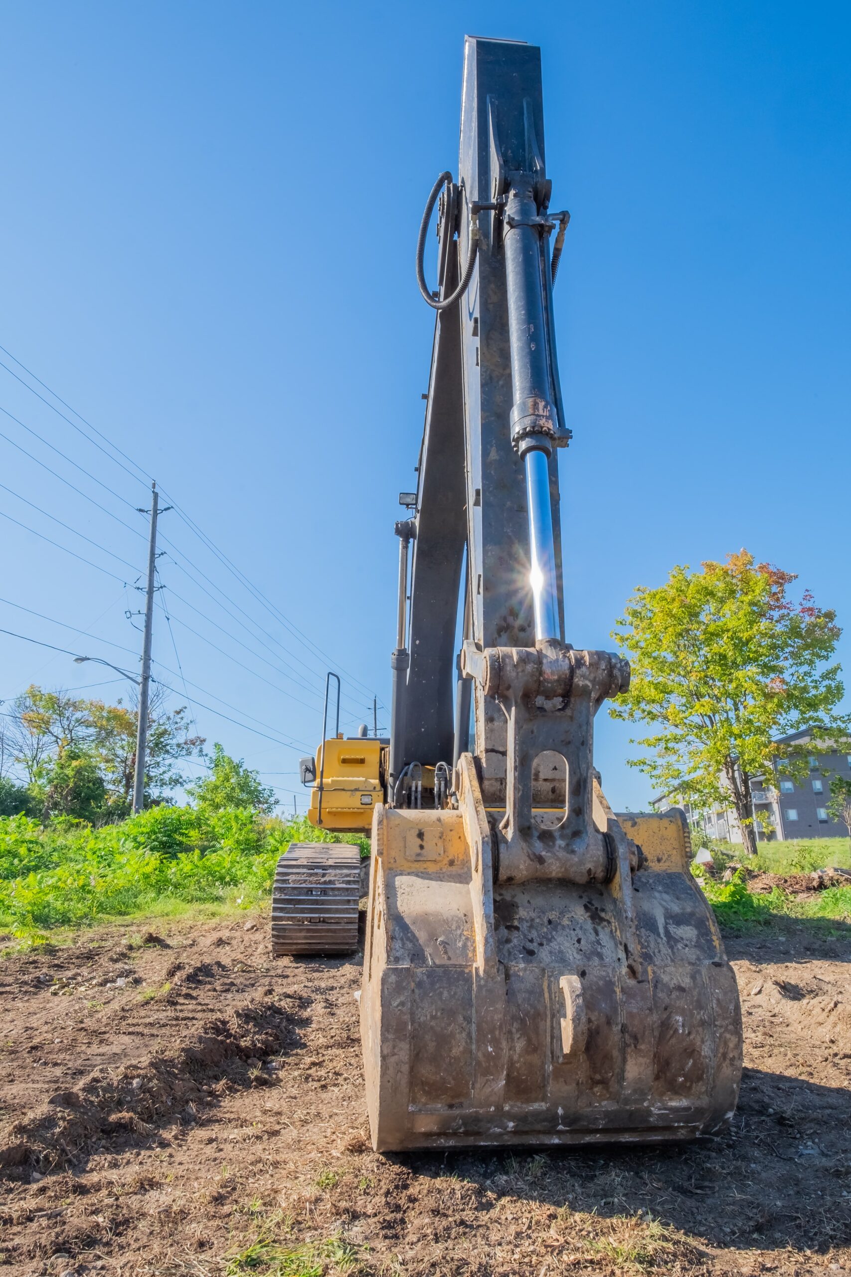 Large earthmoving vehicle with attachment