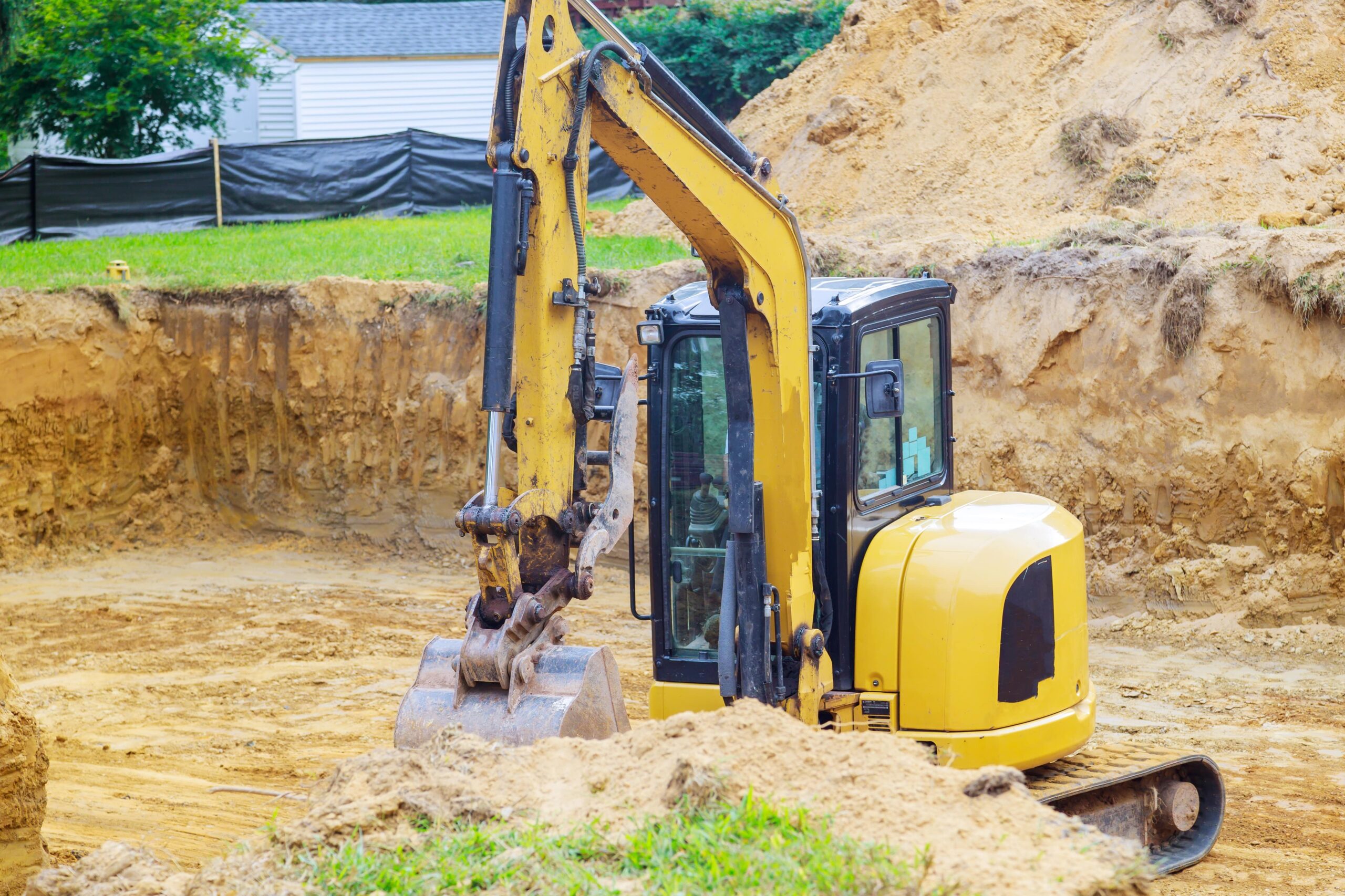 Earthmoving machine working on land clearing and levelling